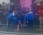 Police stop protesters approaching Trump motorcade in Paris
