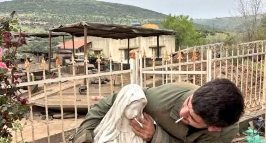 Outrage Erupts Over Israeli Soldier's Disturbing Act Towards Virgin Mary Statue in Lebanon israeli soldier 2 550x295 - Outrage Erupts Over Israeli Soldier's Disturbing Act Towards Virgin Mary Statue in Lebanon