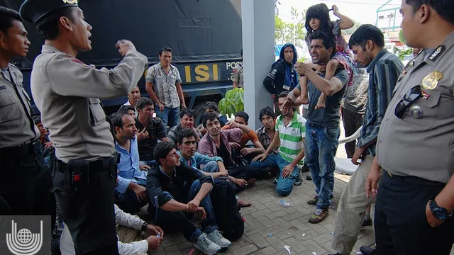 مظاهره صدها تن از مهاجران افغان در کمپی در اندونزیا